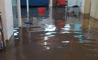 Basement with boiler, cabinets and washing machine completely flooded in West Palm Beach, FL