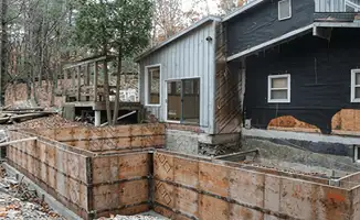 Prepared site with foundation forms for home remodeling and addition project in West Palm Beach, FL